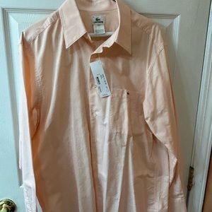 Pale pink Lacoste Oxford shirt.